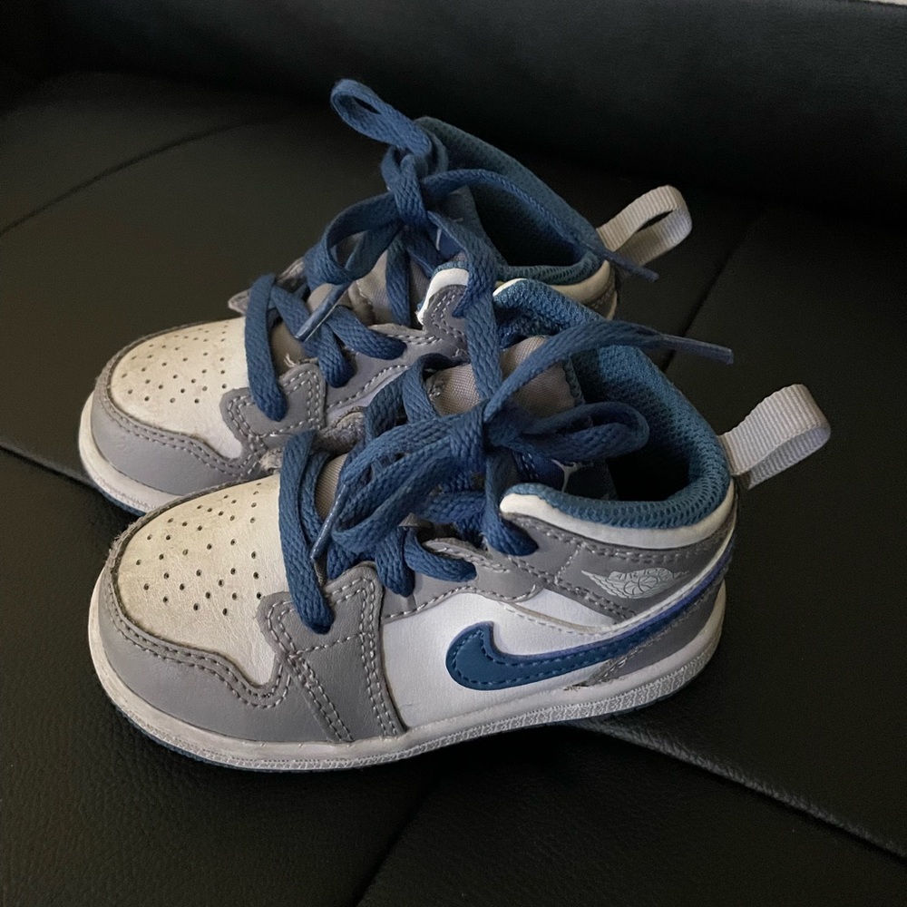 Gray white and Blue high top Jordan’s Size 5.5